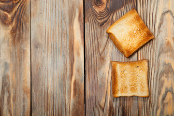 Toast on a rustic wooden background