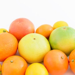 Fruit's still life. Citrus fruits - lemon, orange, grapefruit, sweetie and pomelo isolated on white background.