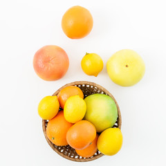 Lemon, orange, grapefruit and mandarine on white background. Flat lay, top view. Fruit's background