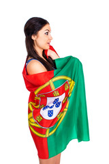 Young woman holding a large flag of Portugal