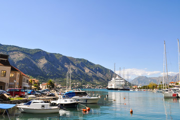 Fototapeta na wymiar The embankment of the old city of Europe, Boka-Kotorska bay, Montenegro. Cruise on the Adriatic Sea