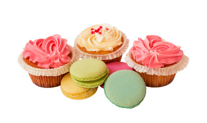 Sweet colorful macaroons and cupcakes isolated on white background. Selective focus