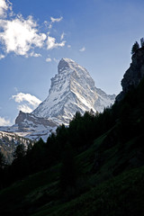 Summer hiking in the mountains near The Matterhorn and Zermatt