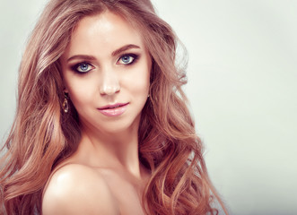 Fototapeta premium Beautiful Young Woman with clean fresh skin .