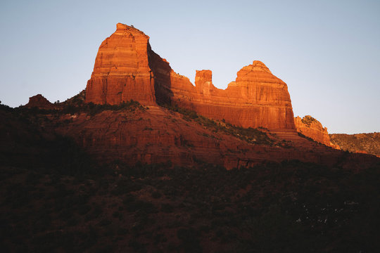 View of rock formation peak at sunset