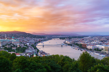 Evening panorama of Budapes from Gellert Hill with a beautiful sunset sky