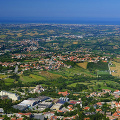 Fototapeta na wymiar San-Marino - August, 8, 2016: Panorama with views of the surrounding area of San-Marino, one of the smallest counties in the world