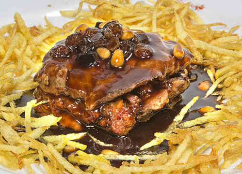 Presa ibercica con pasas y vino PX