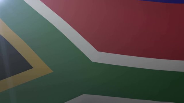 Flag of South Africa waving on flagpole in the wind, national symbol of freedom