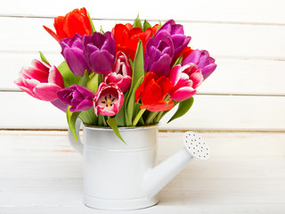 Tulip bouquet on  wooden background, copy space
