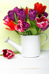 Tulip bouquet on  wooden background, copy space