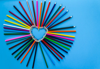 Abstract blur background. Crayon heart - Heart shape made of colored pencils