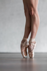 Young beautiful dancer posing in studio