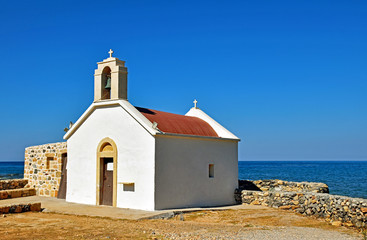 Small church by the sea in Chersonissos on the island of Crete, Greece