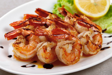 Grilled shrimps on a plate - 141059791