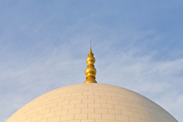 Fototapeta na wymiar Dome of the mosque against blue skies in Abu Dhabi, UAE