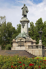 Fototapeta na wymiar Adam Mickiewicz monument in Warsaw, Poland, Europe