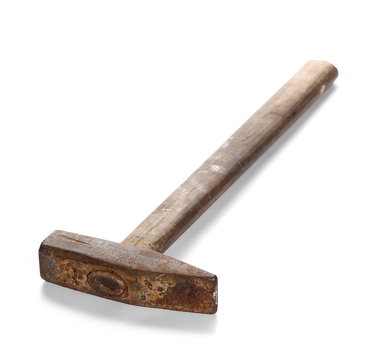 Old rusty metal hammer with wooden handle, isolated on white
