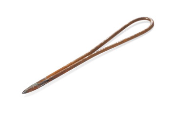 Old rusty metal needle for holes, isolated on white background
