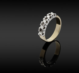 Female gold ring with diamonds