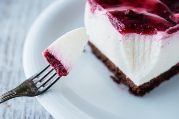 Delicious and sweet cheesecake with cherry jelly