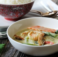 Thai Green curry served with jasmine rice, selective focus
