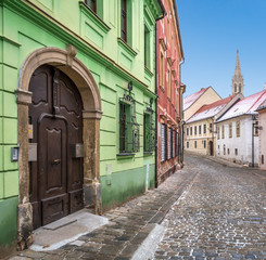 Fototapeta na wymiar Kapitulska Street in Bratislava in a winter morning
