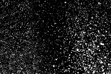 High resolution falling snow isolated on black background . Design element