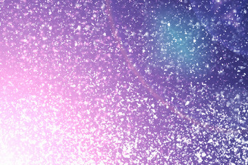 Obraz premium Magic festive pink or serenity background. Bokeh light and sparkles. Abstract glitter lights