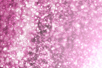 Magic festive pink or serenity background. Bokeh light and sparkles. Abstract glitter lights