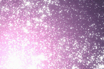Magic festive pink or serenity background. Bokeh light and sparkles. Abstract glitter lights