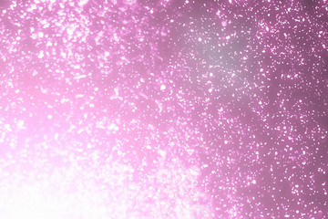Magic festive pink or serenity background. Bokeh light and sparkles. Abstract glitter lights
