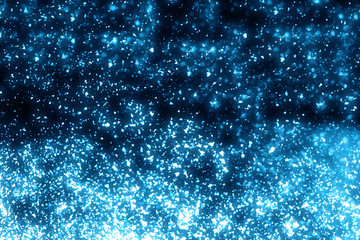 Abstract blue round  bokeh or glitter lights isolated on black background. Circles and defocused particles