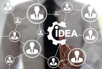 Idea business concept. Teamwork and brainstorm - generation in social network people ideas. Development team office work technology. Man touched gear idea icon on virtual screen.