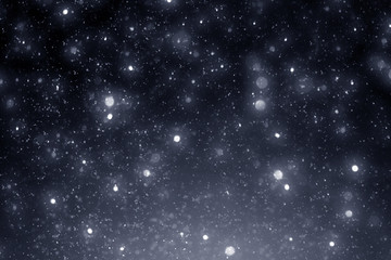 Snowflakes particles and bokeh or glitter lights on silver background. Christmas abstract template