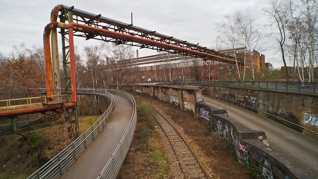 Pipeline and tracks at an old industrial site