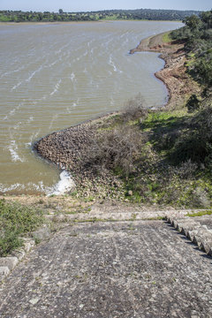 Dam of Cornalvo Reservoir from top of the wall, Extremadura, Spain
