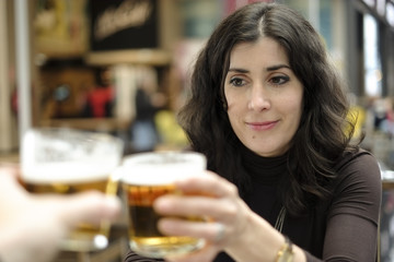 Beer toast in bar terrace