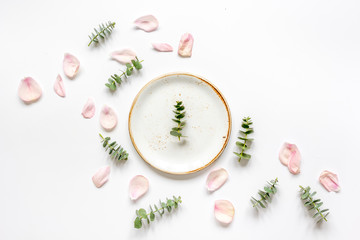 light breakfast disign with flowers on white table top view mock up