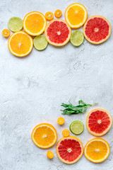 design with blood orange and lime on gray background top view mock-up