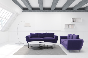 Two purple sofas and a table