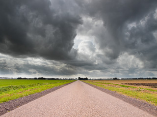 Straight Road under Brooding Sky
