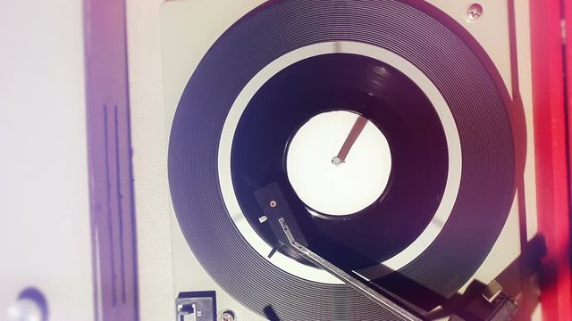 1960's record player with spinning vinyl