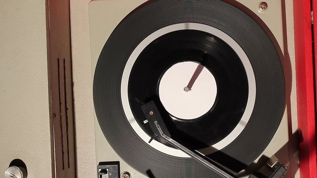 Spinning vinyl disc with white blank label