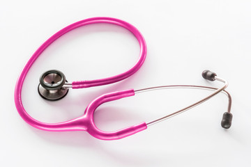 Purple Pink Doctors Stethoscope on White Desk