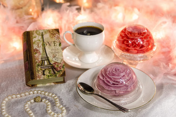 Sweet dessert. Coffee and tasty pudding. Jelly in the form of a flower