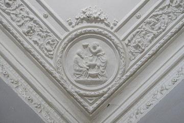 The old gypsum rosette on the celling.