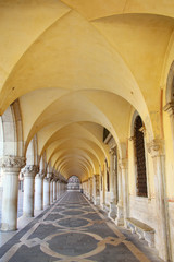 Fototapeta na wymiar Arcade of Palazzo Ducale at Piazza San Marco in Venice, Italy