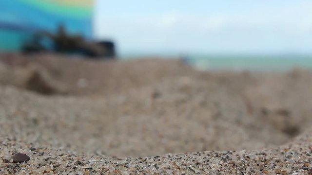 British beach from cloud cover to bright sunshine