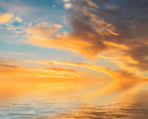Naklejka na ściany i meble Sky and water reflection scene at dusk